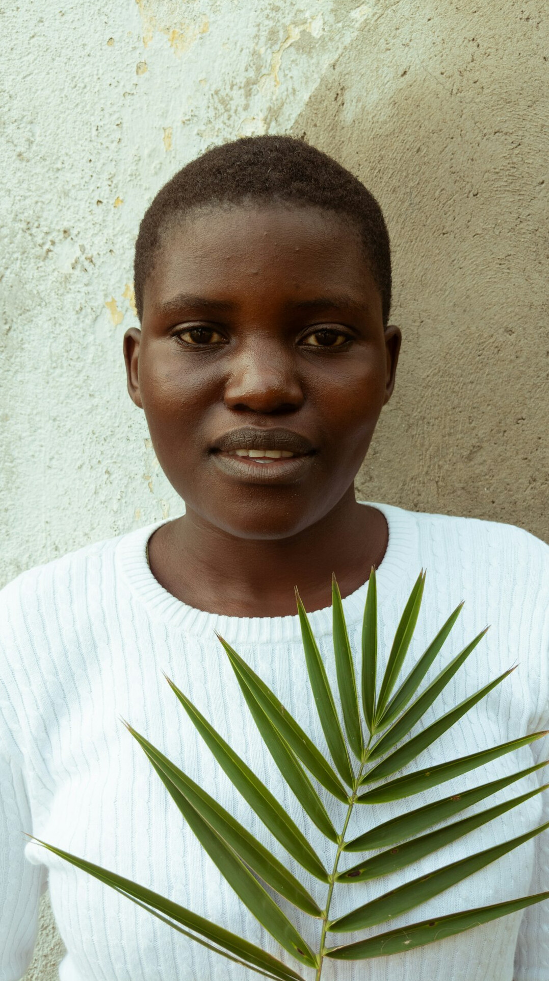 Portrait of a smiling woman with short hair