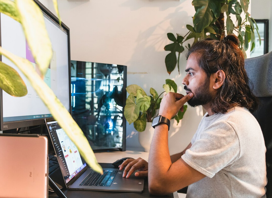 person working on laptop at home